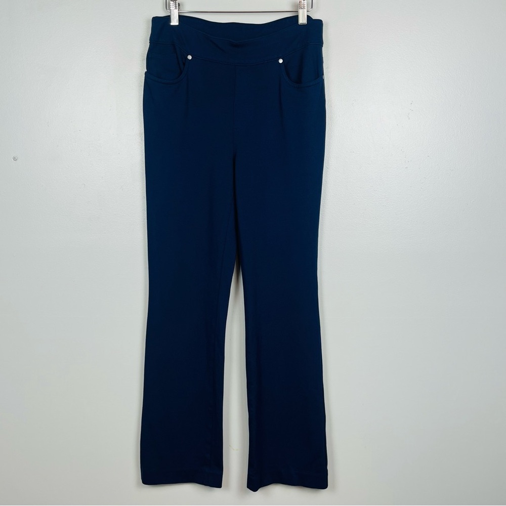 Chico’s dark blue stretchy knit pullon boot cut leg pants, size 0.5 = US 6.